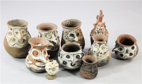 A collection of ten Aibom Village clay vessels